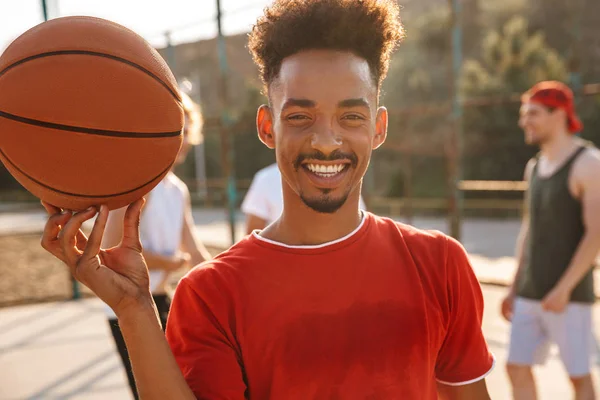 Portrait American Guy Spinning Ball His Finger While Playing Basketball — Stok Foto