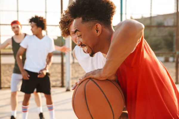 Portrait Energetic Sporty Men Playing Basketball Playground Outdoor Summer Sunny — Stok Foto