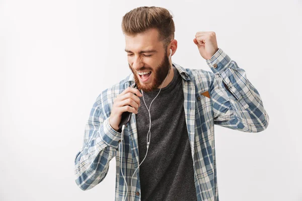 Portrait Cheerful Young Bearded Man Standing Isolated White Listening Music — Stock Photo, Image