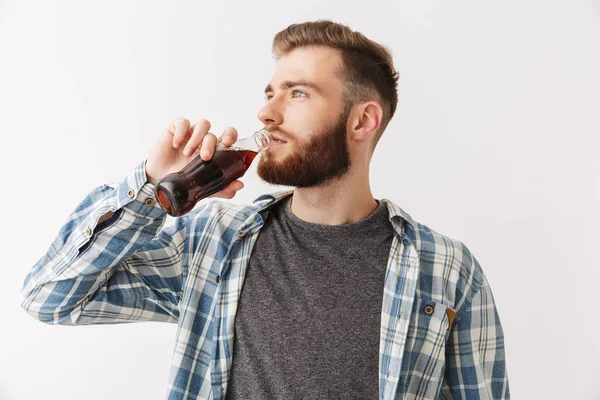 Picture Pleased Bearded Man Shirt Drinking Soda Looking Away Grey — Stock Photo, Image