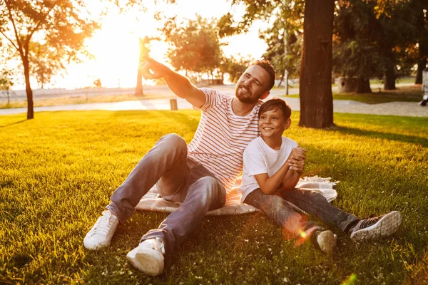 Happy Father Spending Time His Little Son Park Pointing Finger — Stock Photo, Image