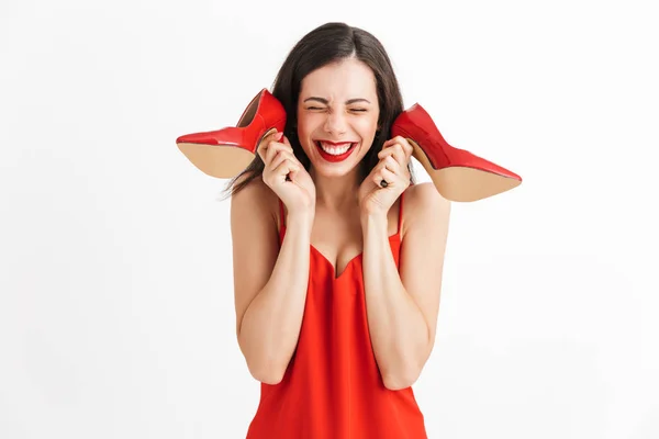 Imagen Joven Hermosa Mujer Bonita Posando Aislada Sosteniendo Zapatos Rojos —  Fotos de Stock