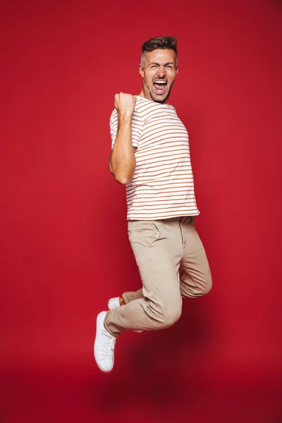 Full Length Photo Successful Man Striped Shirt Screaming Clenching Fists — Stock Photo, Image