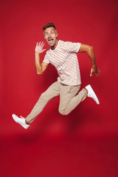 Full Length Photo Joyful Man Striped Shirt Jumping Screaming Isolated — Stock Photo, Image