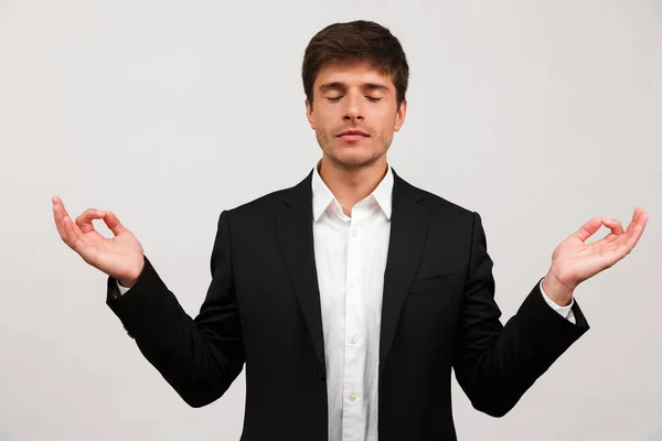 Image Young Businessman Standing Isolated White Background Wall Meditate — Stock Photo, Image