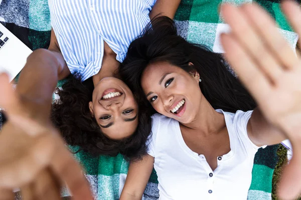 Top View Two Young Girls Students Laying Grass Campus Outstretche — Stock Photo, Image