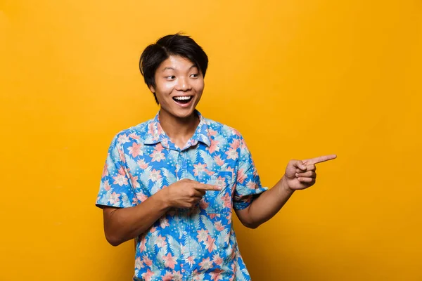 Image Excited Young Asian Man Posing Isolated Yellow Background Pointing — Stock Photo, Image