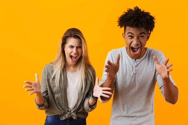 Image Agressive Screaming Young Cute Loving Couple Posing Isolated Yellow — Stock Photo, Image