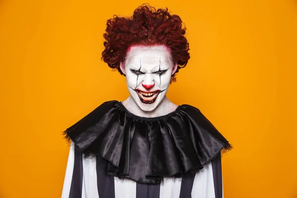 A Man Costumed as Pennywise Making Scary Face Reaction · Free Stock Photo