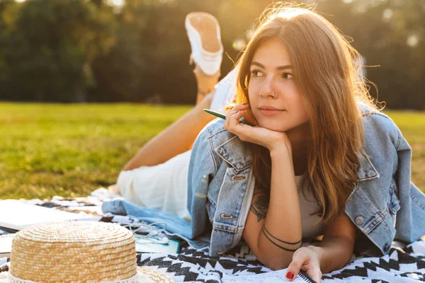 Pretty Young Girl Laying Grass Park Writing Notebook — Stock Photo, Image