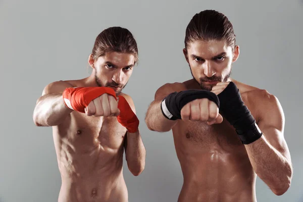 Portrait Two Serious Muscular Shirtless Twin Brothers Standing Isolated Gray — Stock Photo, Image
