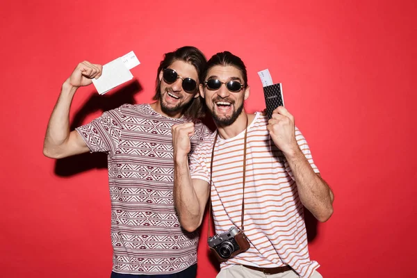 Portrait Two Young Excited Twin Brothers Isolated Red Background Showing — Stock Photo, Image