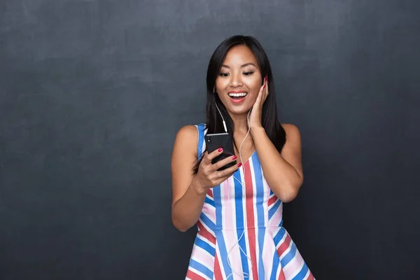 Image Pleased Asian Woman 30S Wearing Earphones Listening Music Black — Stock Photo, Image