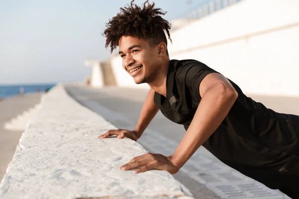 Image Handsome Young Guy Sportsman Make Exercises Outdoors Beach — Stock Photo, Image