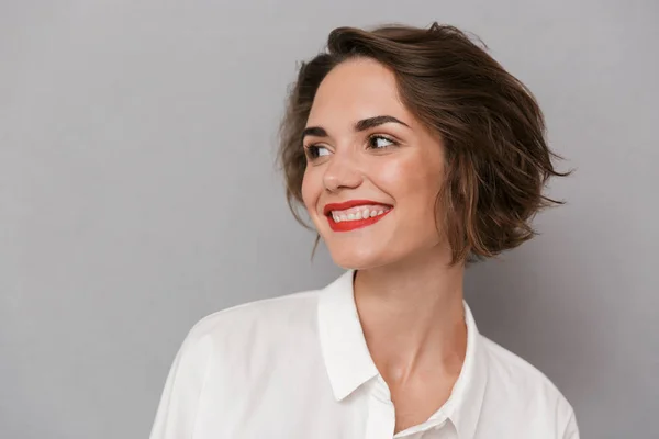 Portrait Une Jeune Femme Souriante Tenant Isolée Sur Fond Gris — Photo