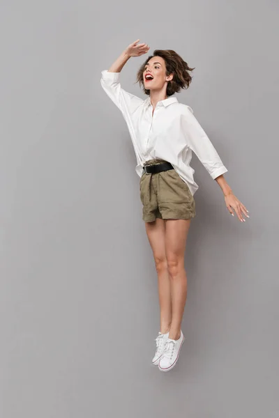 Immagine Figura Intera Donna Caucasica 20S Sorridente Saltando Isolato Sfondo — Foto Stock