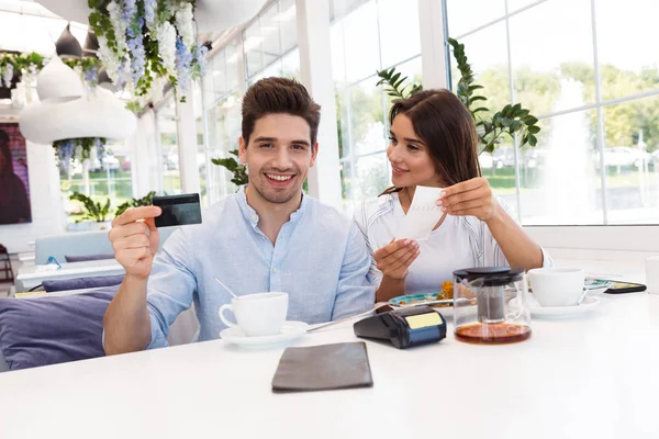 Image Young Happy Loving Couple Sitting Cafe Holding Credit Card — Stock Photo, Image