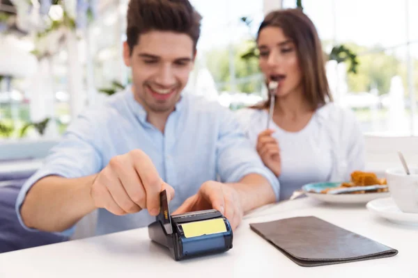 Image Young Happy Loving Couple Sitting Cafe Holding Credit Card — Stock Photo, Image