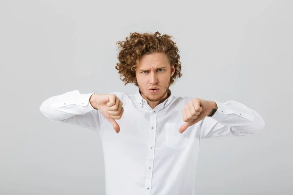 Portrait Disappointed Young Man Curly Hair Isolated White Background Giving — Stock Photo, Image