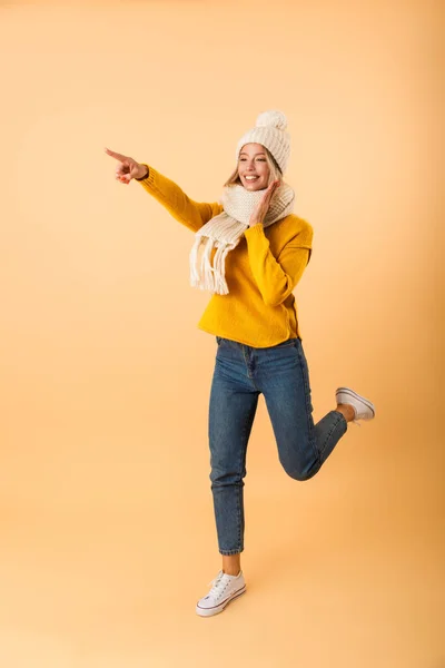 Photo Cute Excited Woman Wearing Scarf Hat Posing Isolated Yellow — Stock Photo, Image