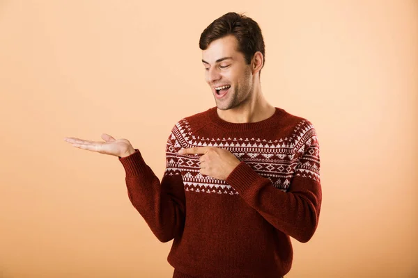 Image Cheerful Man 20S Bristle Wearing Knitted Sweater Pointing Finger — Stock Photo, Image