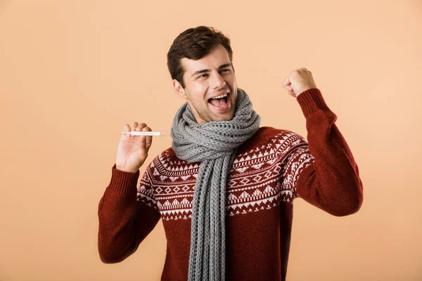 Portrait Happy Young Man Dressed Sweater Scarf Isolated Beige Background — Stock Photo, Image