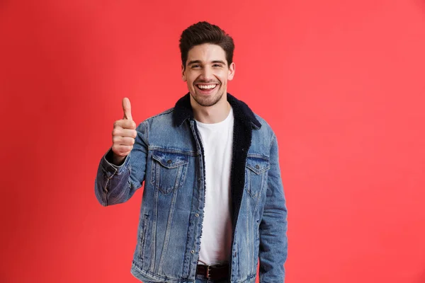 Portrait Cheerful Young Man Dressed Denim Jacket Standing Isolated Red — Stock Photo, Image
