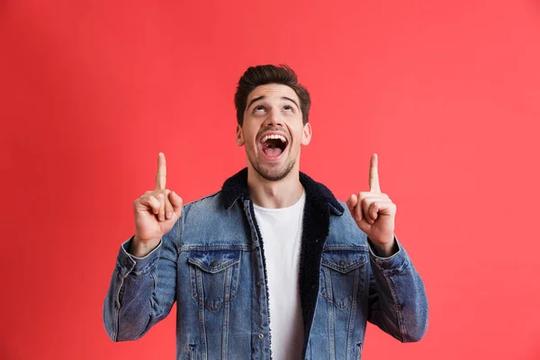 Portrait Cheerful Young Man Dressed Denim Jacket Standing Isolated Red — Stock Photo, Image