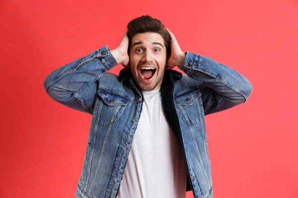 Portrait Excited Young Man Dressed Denim Jacket Standing Isolated Red — Stock Photo, Image