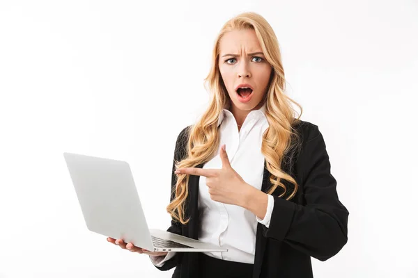 Photo Surprised Businesswoman Wearing Office Suit Holding Silver Laptop Isolated — Stock Photo, Image