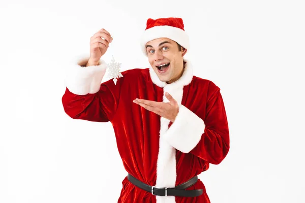 Obraz Člověka Radostné 30S Kostýmu Santa Claus Drží Papír Vločka — Stock fotografie