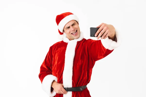 Imagem Homem Sorridente Dos Anos Traje Santa Claus Segurando Smartphone — Fotografia de Stock