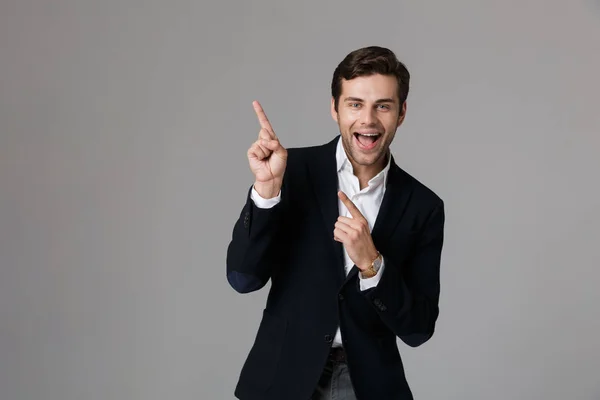 Close Portrait Cheerful Young Businessman Dressed Suit Isolated Gray Background — Stock Photo, Image