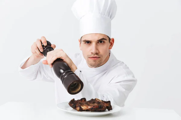 Serious Man Chef Cook Wearing Uniform Peppers Cooked Beef Steak — Stock Photo, Image