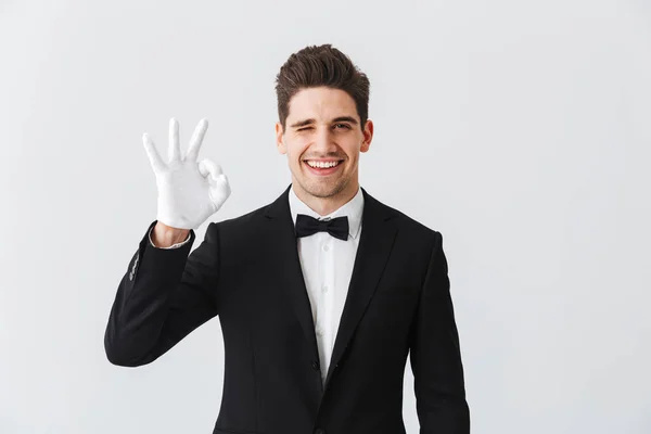 Portrait Handsome Young Man Waiter Wearing Tuxedo Gloves Standing Isolated — Stock Photo, Image