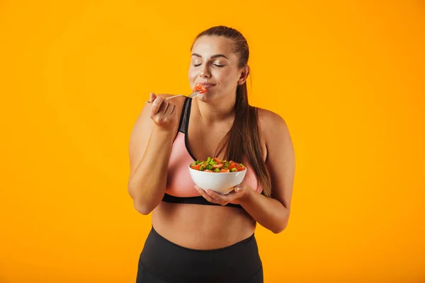 Image Lovely Chubby Woman Tracksuit Eating Green Salad Plate Isolated — Stock Photo, Image