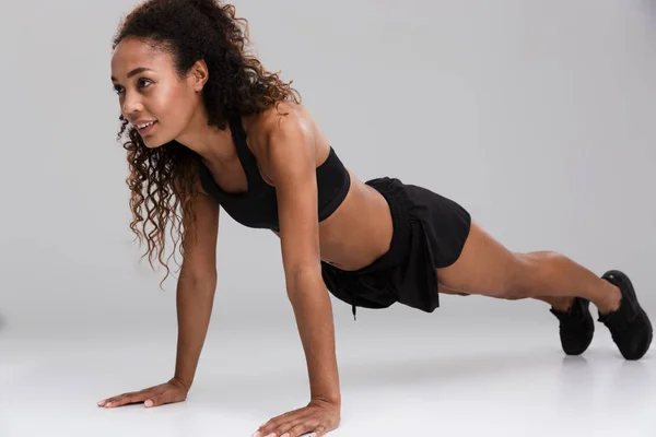 Portrait Afro American Young Strong Sportswoman Doing Plank Exercise Isolated — Stock Photo, Image