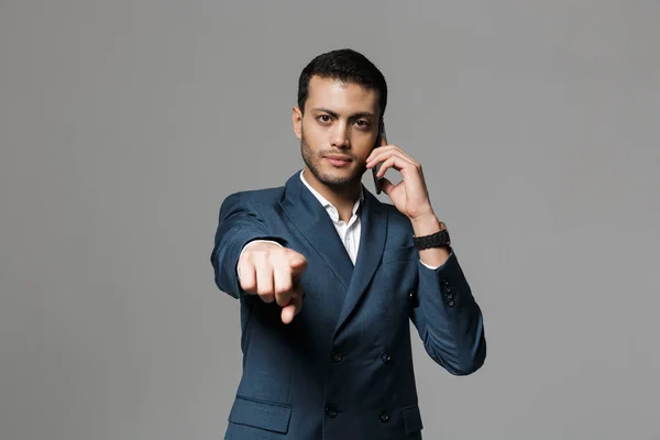 Image Handsome Business Man Talking Mobile Phone Posing Isolated Grey — Stock Photo, Image