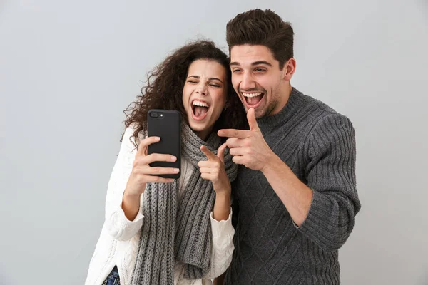 Cheerful Couple Wearing Sweaters Standing Isolated Gray Background Making Video — Stock Photo, Image