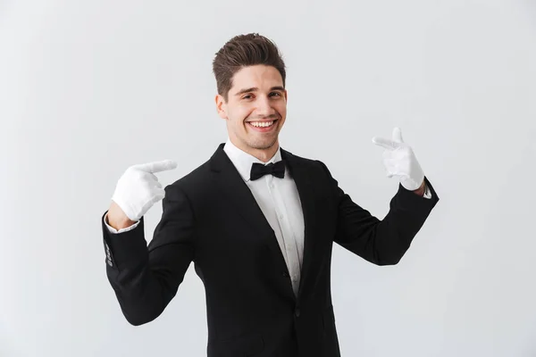 Portrait Handsome Young Man Waiter Wearing Tuxedo Gloves Standing Isolated — Stock Photo, Image