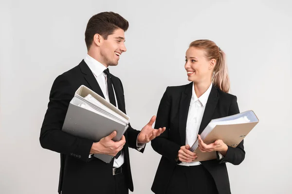 Cheerful Young Business Couple Standing Isolated Gray Background Holding Folders — Stock Photo, Image