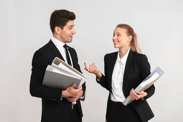 Cheerful Young Business Couple Standing Isolated Gray Background Holding Folders — Stock Photo, Image