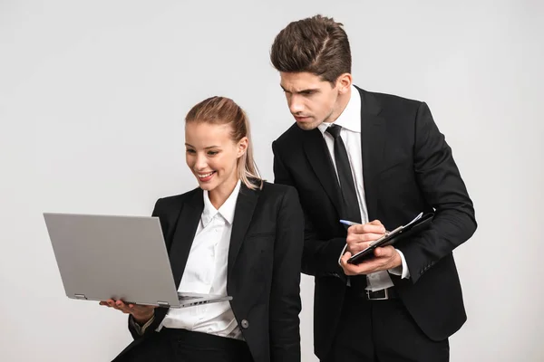 Smiling Business Couple Wearing Suits Isolated Gray Background Working Together — Φωτογραφία Αρχείου