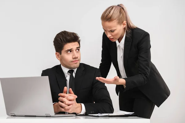 Upset Business Couple Wearing Suits Isolated Gray Background Working Together — Stock Photo, Image