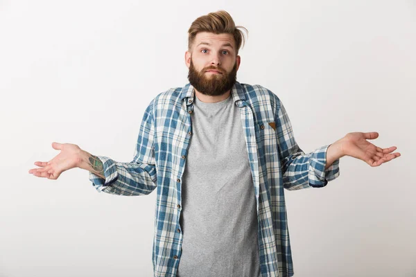 Jeune Homme Confus Habillé Chemise Carreaux Debout Isolé Sur Fond — Photo