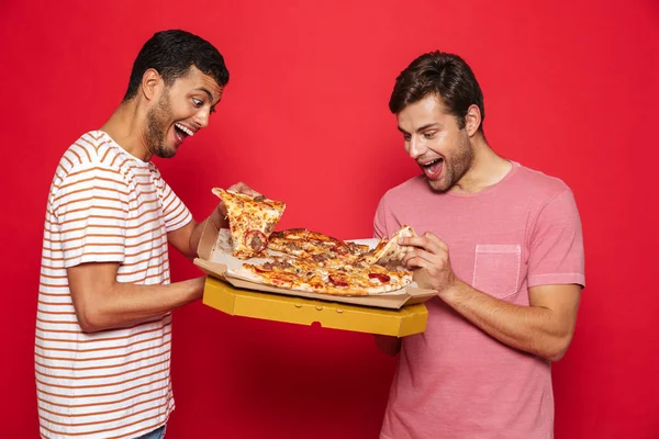 Image Handsome Pleased Happy Young Men Friends Isolated Red Wall — Stock Photo, Image