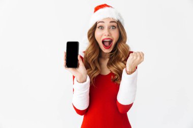 Noel kostümü cep telefonu görüntüsünü gösterilen şok bir duygusal kadının fotoğrafını kazanan jest yapmak.