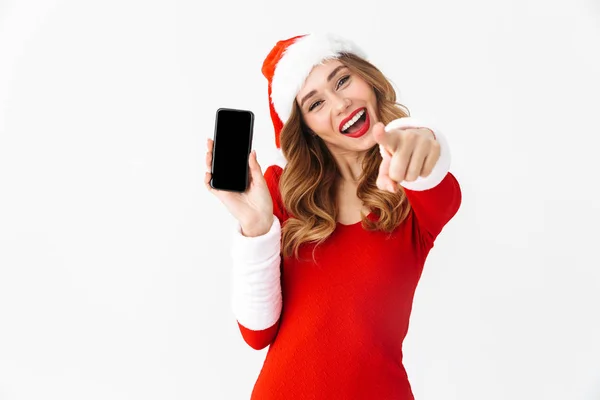 Bild Vacker Känslomässiga Kvinna Jul Kostym Visar Displayen Mobiltelefon Pekar — Stockfoto