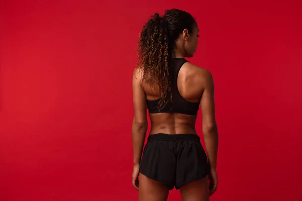 Portrait African American Woman 20S Black Sportswear Standing Back Isolated — Stock Photo, Image