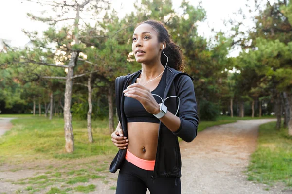 Image Happy Woman 20S Wearing Black Tracksuit Earphones Working Out — Stock Photo, Image